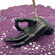 BLACK RESIN HAND INCENSE HOLDER