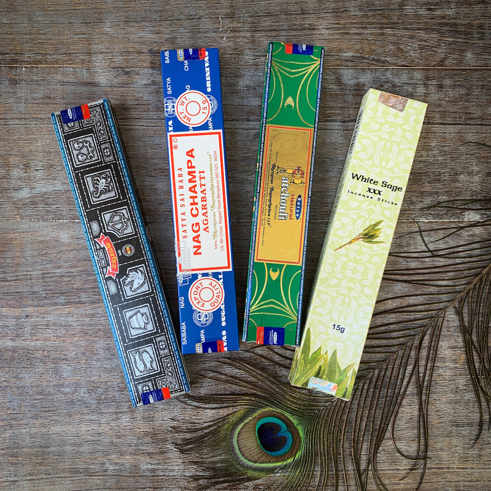 Incense packs with peacock feather